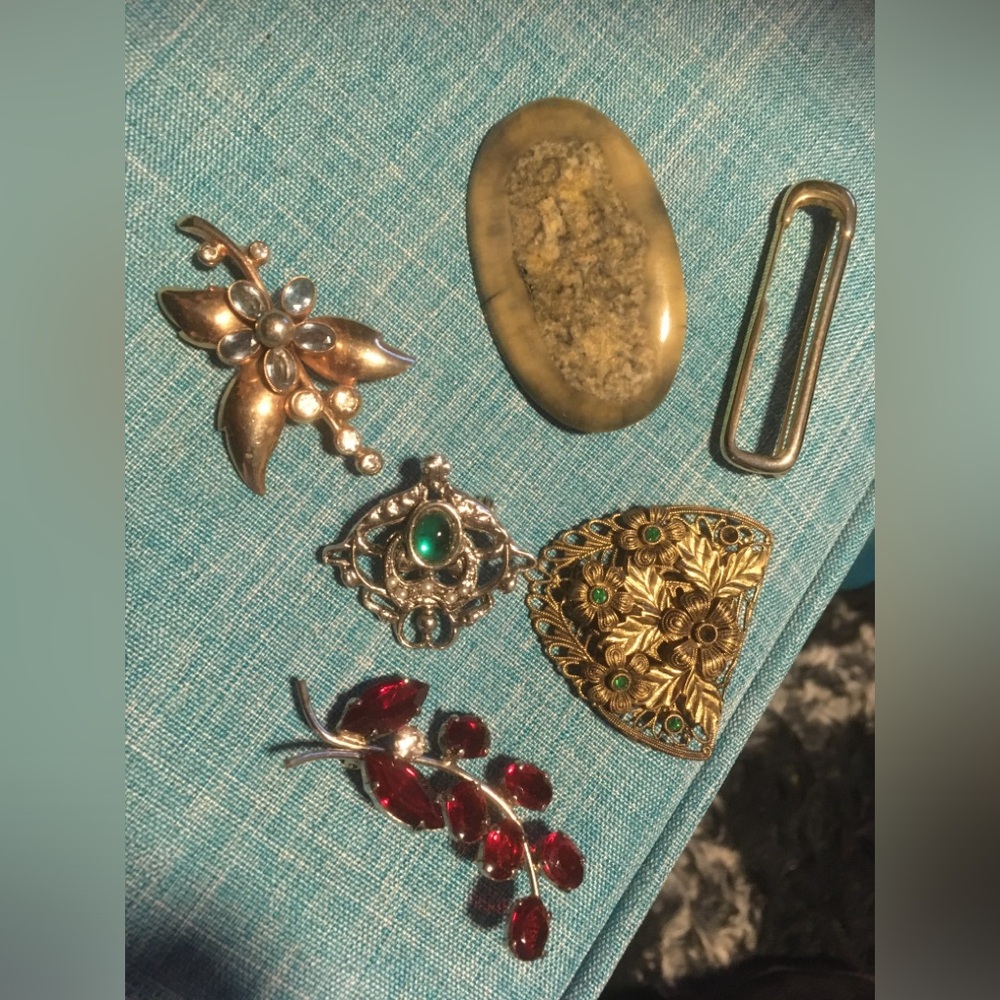 Elegant Gold and Silver Brooches and one clip